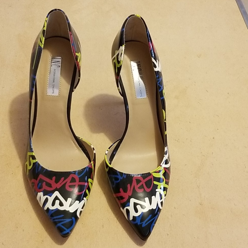 International Concept black patent leather pumps